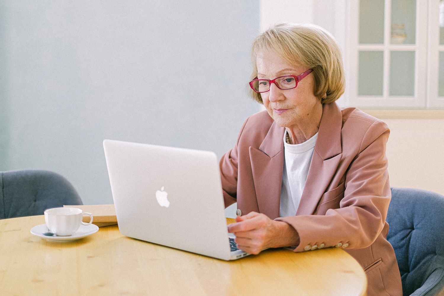 A woman preparing at her laptop